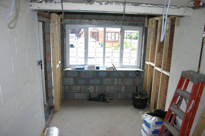 an image of an converted garage to living space during renovation