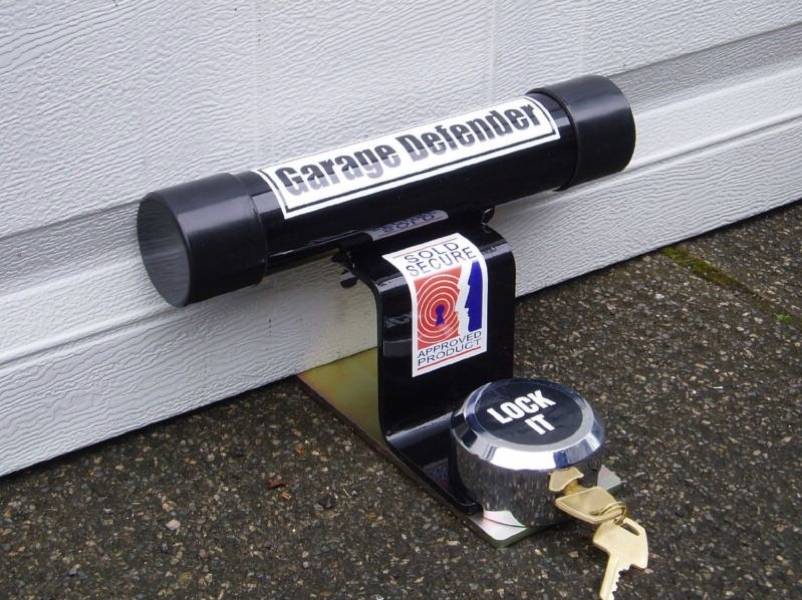an image of a black garage door defender