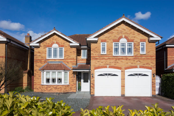 house with two single garage doors