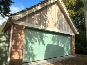 Double Chartwell Green garage door on a panelled garage