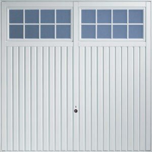 Detail of an up and over garage door showing a traditional top glazed design